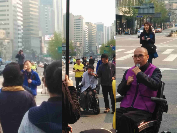 총3장의 사진 가두행진을 멈추고 발언하는 모습