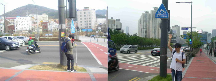 총2장의 사진 왼쪽 사진 이상훈 팀장이 자전거횡단 표지판 밑에 서 있는 사진, 오른쪽 사진 자전거횡단 표지판 밑에 이상훈 팀장이 손을 들고 서 있는 사진